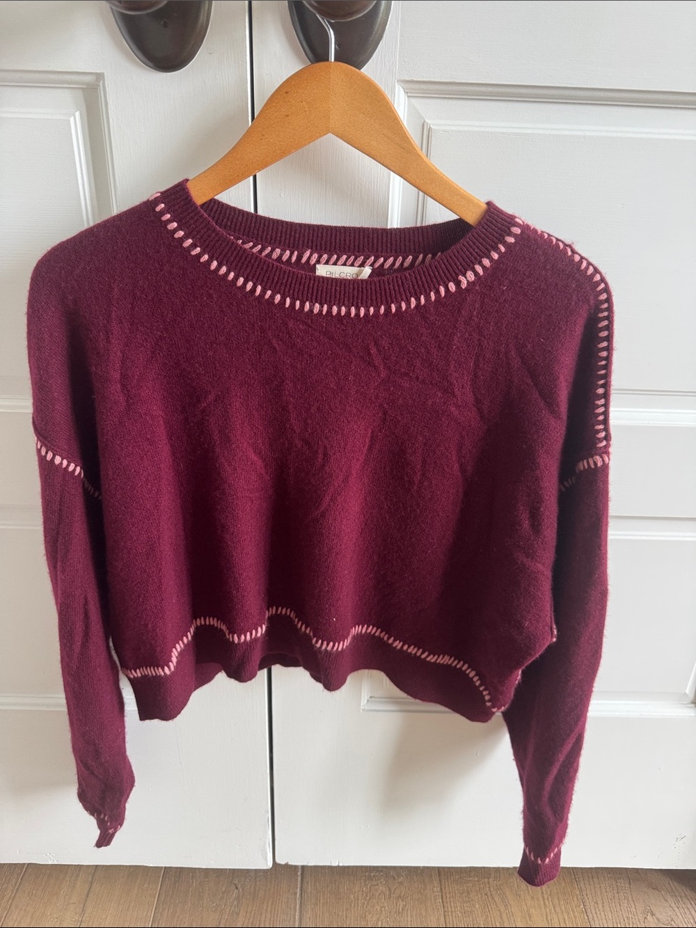 Pilcro Cropped Crewneck Sweater in Burgundy with Pale Pink Trim